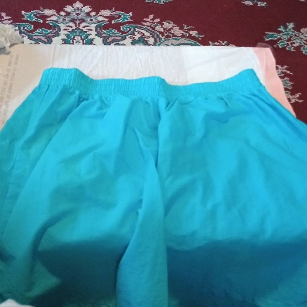 Athletic Works large shorts and Pacifica medium swimsuit cover top